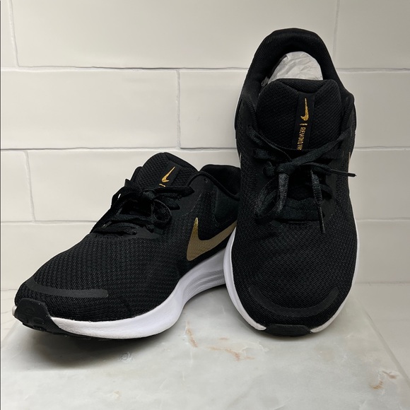 Nike Shoes - Nike Black & Gold Athletic Running Trainers